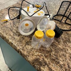 Modela breast pump