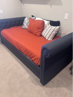 Twin upholstered trundle bed and mattress
