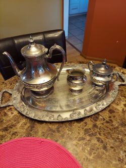 Silver on copper teapot and tray (4 pieces)