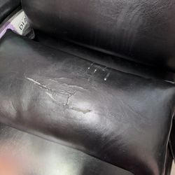 Recliner with black pillow