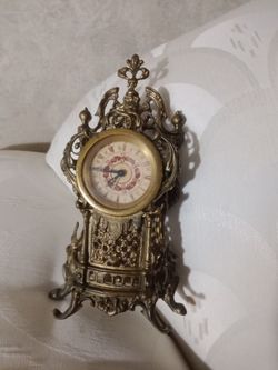 Vintage solid brass mantle clock, clock doesn't work but the alarm does.
