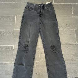 black ripped jeans 24w