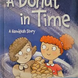 Saralee Siegel Ser: A Donut in Time: A Hanukkah Story by Elana Rubinstein