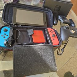 Switch With 4 Games...2 Controllers And Two Game Controllers