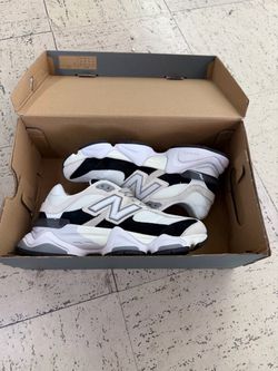 New Balance 9060 white sneakers with black accents