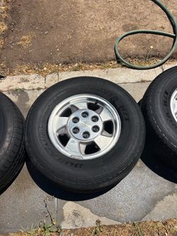 OEM 16" Chevy / GMC 6-Lug Wheels & Tires - Set of 4 with center caps