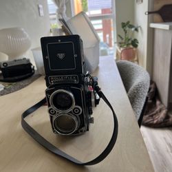 rolleiflex 2.8 with upgraded focusing screen. 