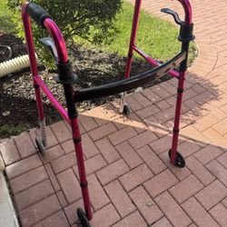 4 Wheeled walker in excellent condition $65