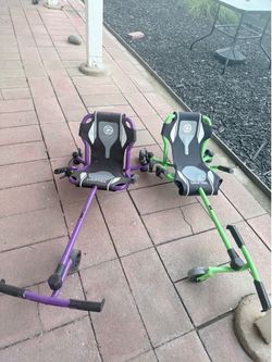 Two EzyRoller Drifter Ride-On Scooters - Purple & Green