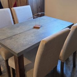 Dining Table And Four Chairs
