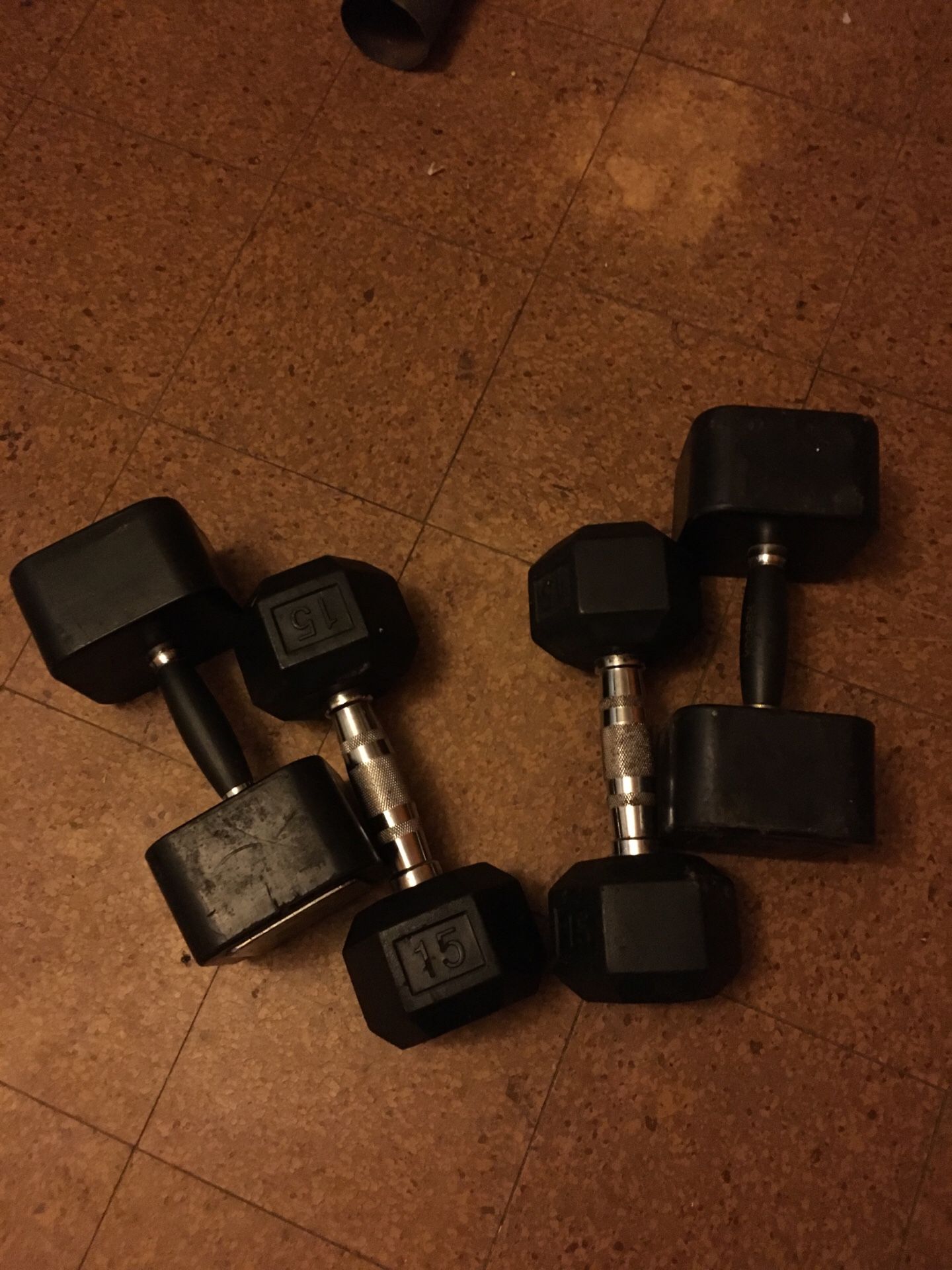 Two 15s and two 25s dumbbells