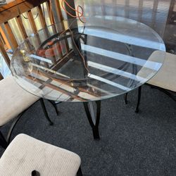 Table and Four Chairs