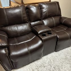 Leather 2 seat couch with cup holder and storage