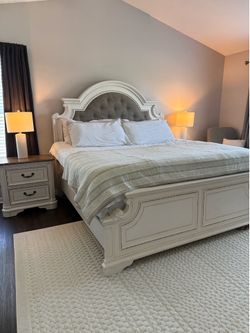 Ashley Furniture "Realyn" collection King size bed frame.
