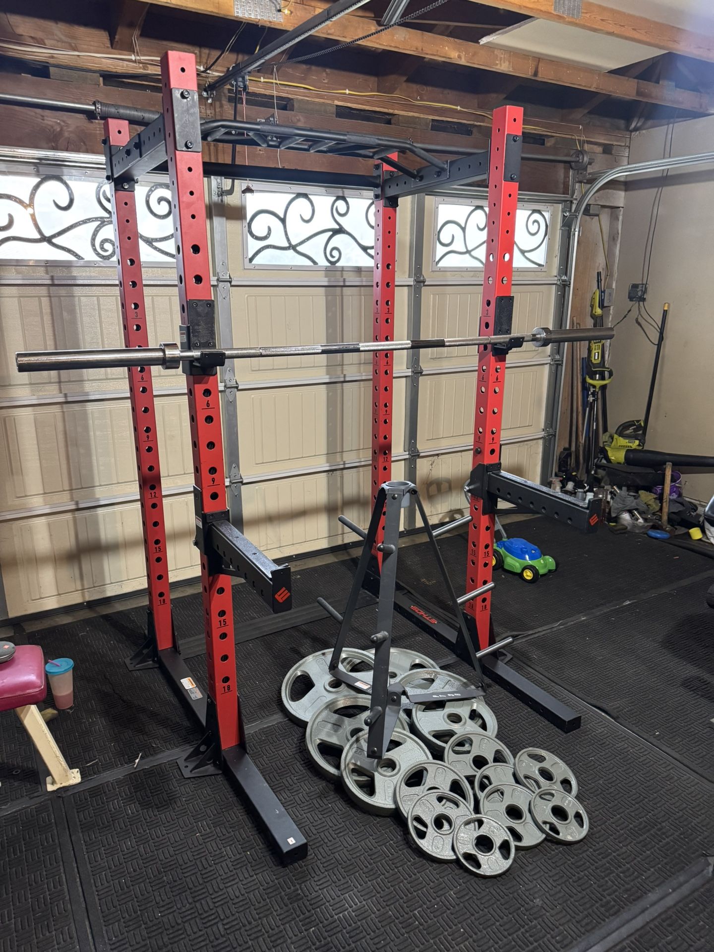 Ethos power rack with 7ft 45lbs bar plus 255lbs of Olympic weights and weights tree