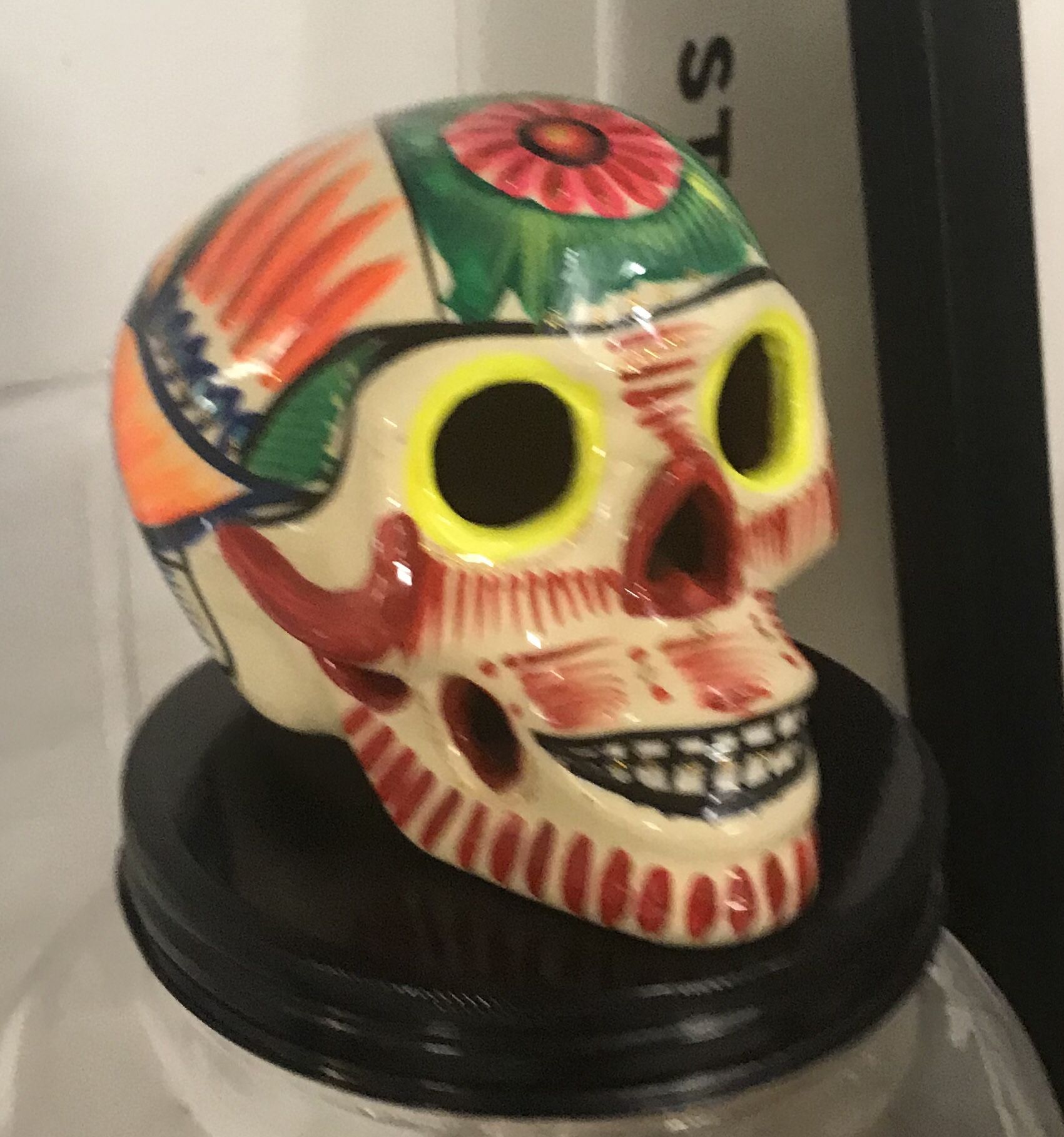 Painted skull and Skull shape beverage dispenser.