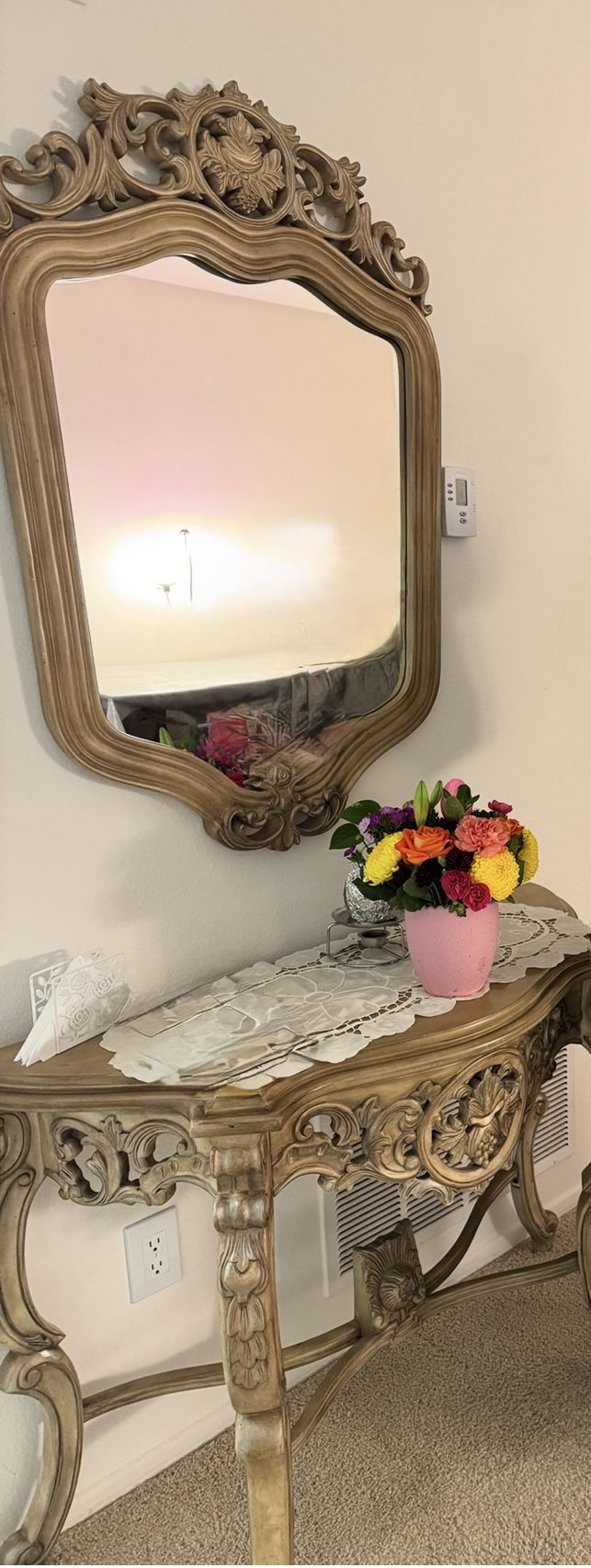 unique hand carved console with mirror.