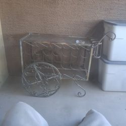 This\nIs an old antique wine cart was boughten at an antique store 43 hundred I want a hundred , give me an offer