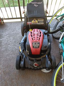 Cortar cesped troy bilt  en buenas condiciones I un weed eater