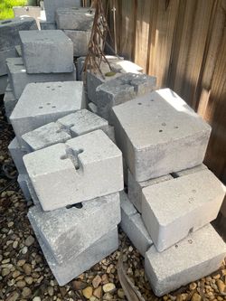 About 60 plus stackable pavers retention wall leftovers