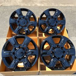 20” GMC Sierra original factory rims in new gloss black