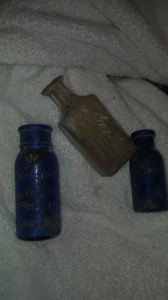 3 Smaller Antique bottles
