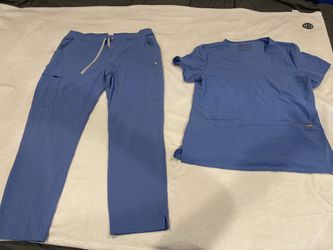 Figs scrubs top and bottom, size M $25