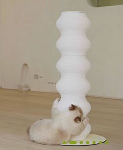 Furry tail cat scratcher