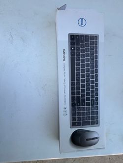 Dell KM7120W Multi-Device Wireless Keyboard and Mouse combo in Titan Gray.