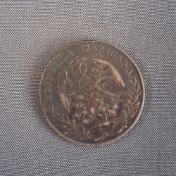 1876 ​​Mexican silver coin