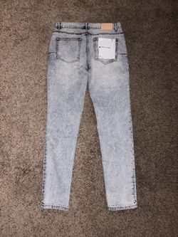 purple jeans size 33/32