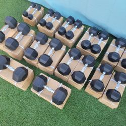 5-50 DUMBBELLS SET.. BRAND NEW 