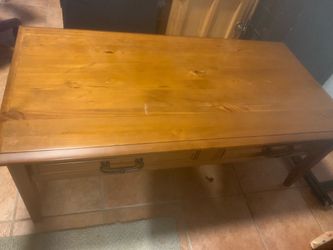 Wooden coffee table with two drawers. Solid piece