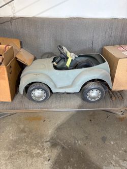Vintage vw bug kids ride on car