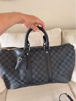 Louis Vuitton Keepall Bandouliere 45 in Damier Graphite.