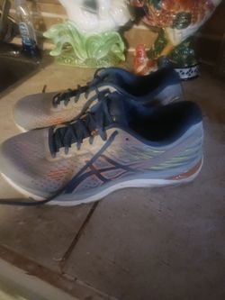 Asics name brand tennis shoes size 9.5 mens