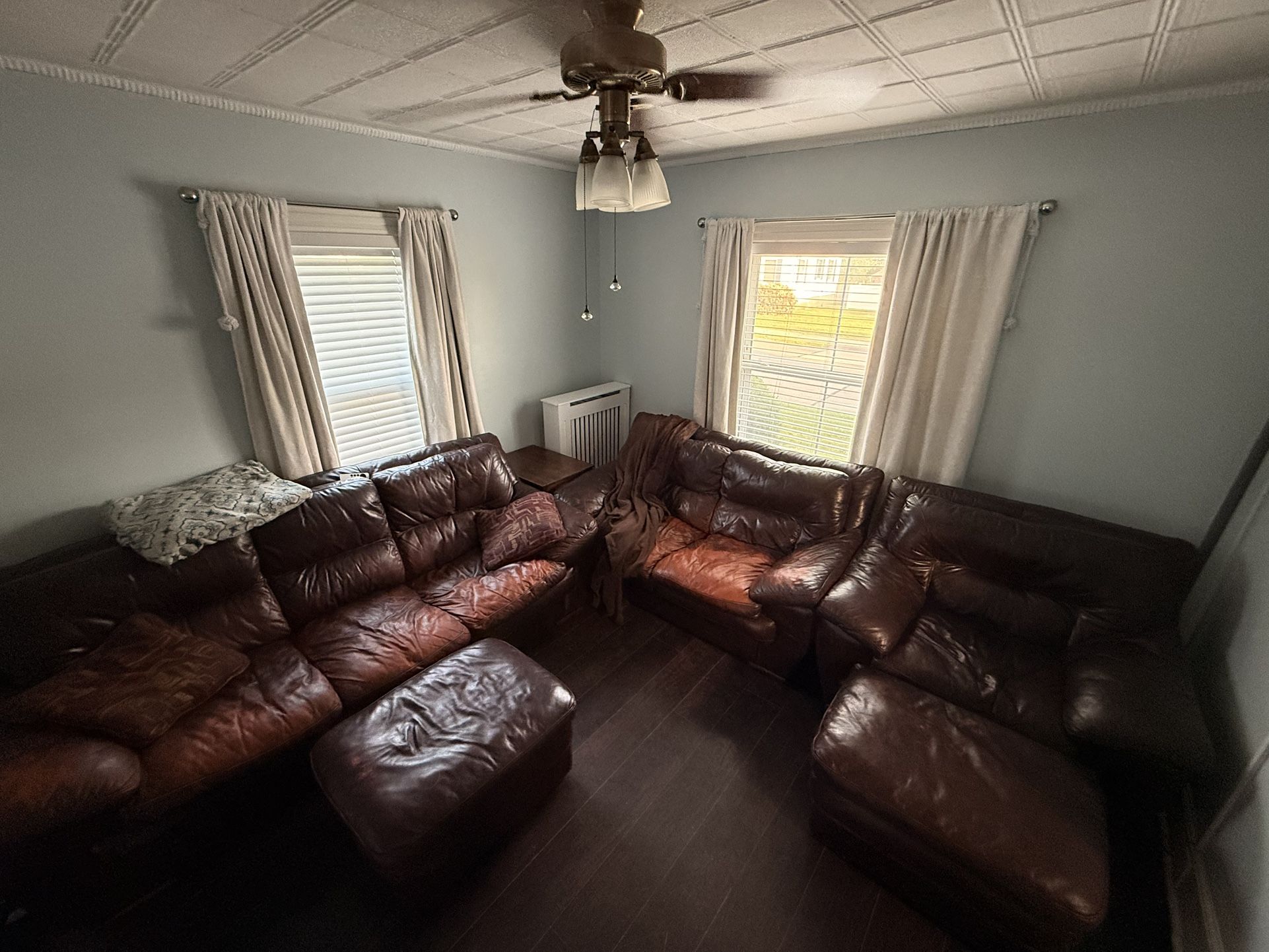 Large Italian leather Couches, Loveseat And Chair With Ottomans