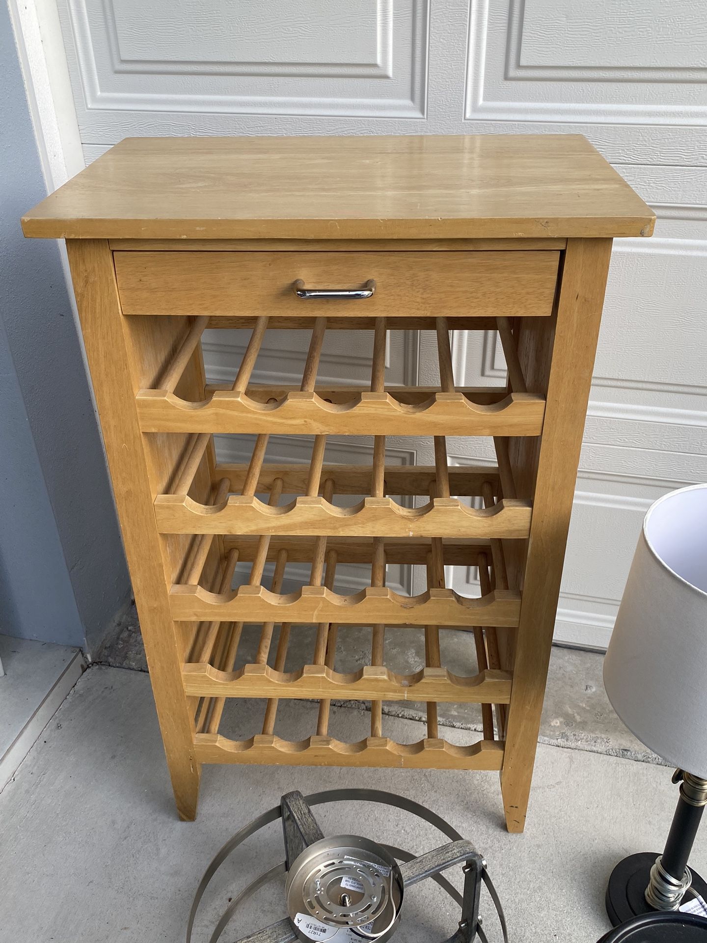 Solid wood wine rack with the drawer. Could use some cleaning. Pick up
