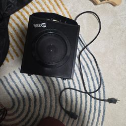 Electric guitar and speaker