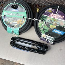 Two Soaker Hoses And An Oscillating Sprinkler 