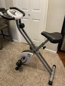 Marcy foldable upright exercise bike with adjustable