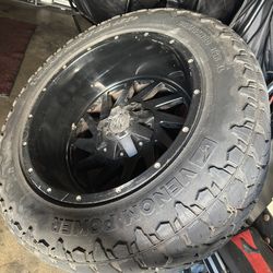 305/55r20 rim & tire