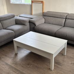 Reclining Sofa And Love Seat Plus Table With Storage