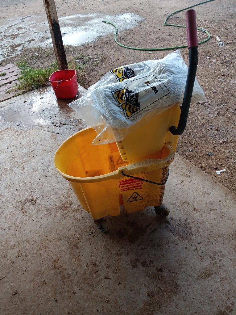 Mop Bucket And New Mop Heads 