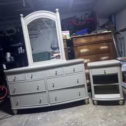 Reallh nice Refurbished dresser with mirror and nightstand  With golden knobs and legs of dresser and nightstand to match. Come get it today!  Drawers