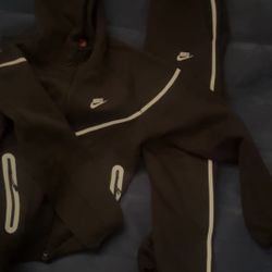 Reflected Nike Tech Suit