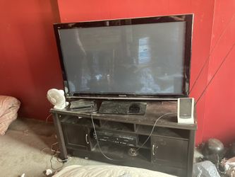 Panasonic 50 inch TV and TV stand