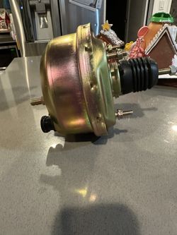 single-diaphragm universal power brake booster, likely with a 7-inch diameter.