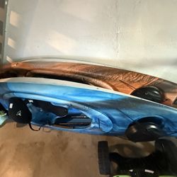 2 Kayaks With 2 Paddles And A Kayak Cart 