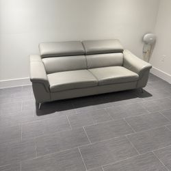 Grey Leather Couch. Delivery included 